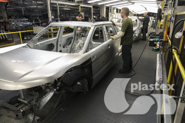 Crossgrip PVC loose laid in a manufacturing environment.